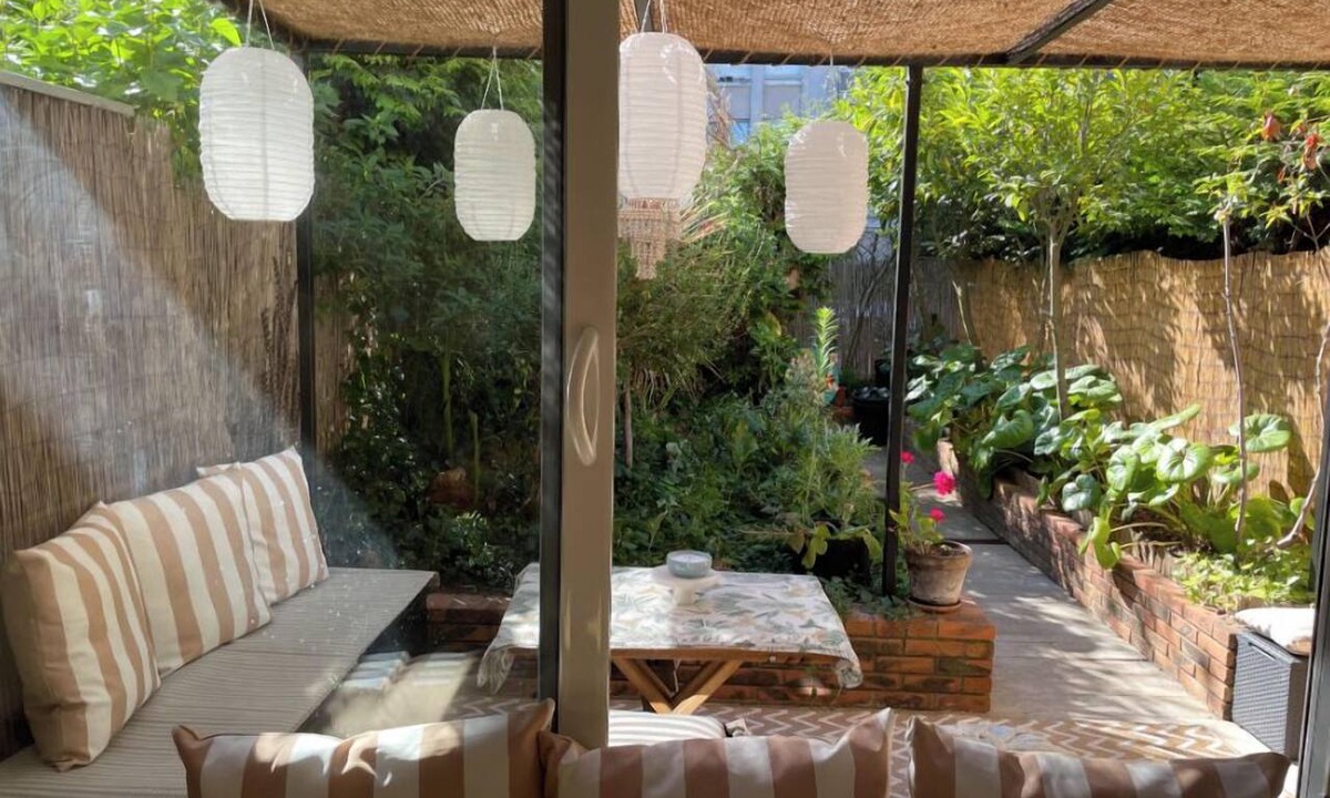 Quartier du Pont-de-Flandre Cabin | A rare gem: a green oasis in Paris—exotic and refined