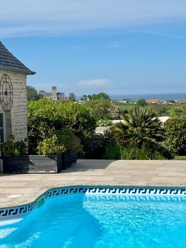 Saint-Come-de-Fresne Apartment | L'Agapanthe, avec accès piscine et salle de sport