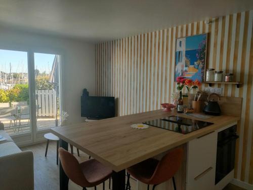 Arzon Apartment | Ref 078 T2 rénové RDC vue port Crouesty