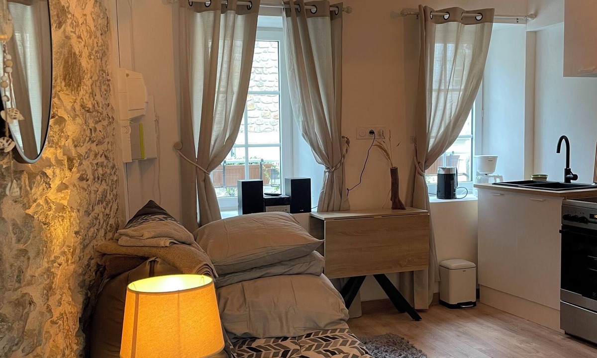 Coutances Apartment | Stone studio with character
