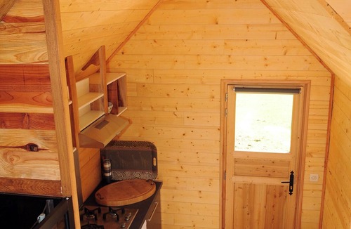 Nivillac Cabin | A tiny house in a quiet meadow—the perfect place to unwind. Sauna