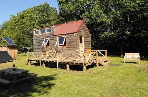 Nivillac Cabin | A tiny house in a quiet meadow—the perfect place to unwind. Sauna