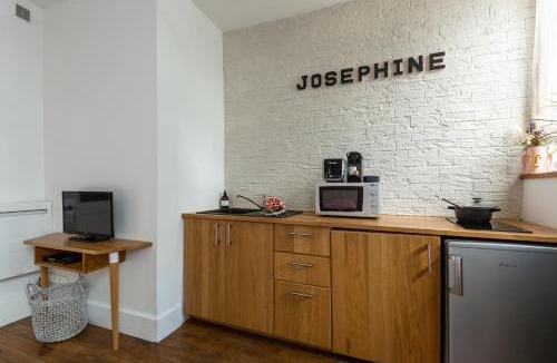 Quartier du Faubourg-Montmartre Apartment | Artisan Lofts courtyard Opéra