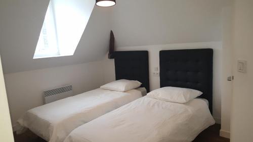 Andouille Hotel | Au Pigeon Blanc