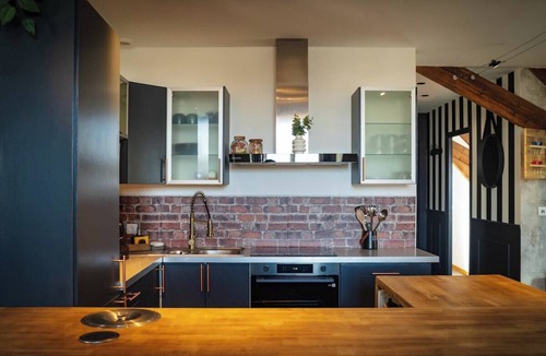 Republique Apartment | British Style, projector, foosball & right in the heart of downtown