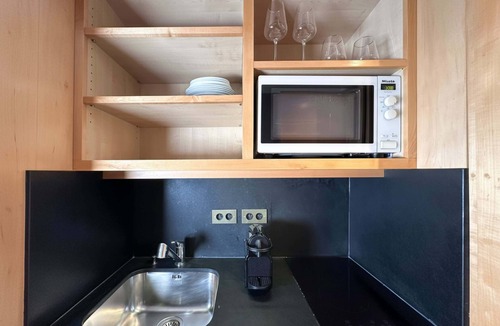 Faubourg-du-Roule Apartment | Champs-Elysees studio with balcony & AC