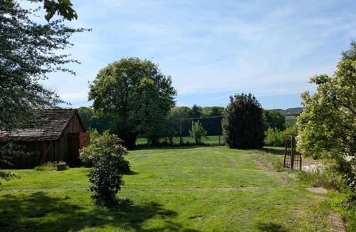Charbonnieres House | Charmante longère percheronne avec cheminée, jacuzzi et verger