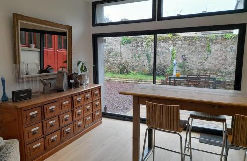 Periers House | loft with a garage feel
