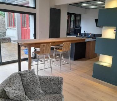 Periers House | loft with a garage feel
