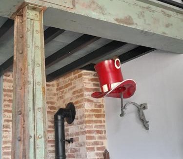 Periers House | loft with a garage feel