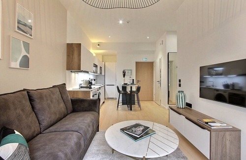 Grenelle Apartment | New Apt - Eiffel Tower - 1 BR with patio and AC