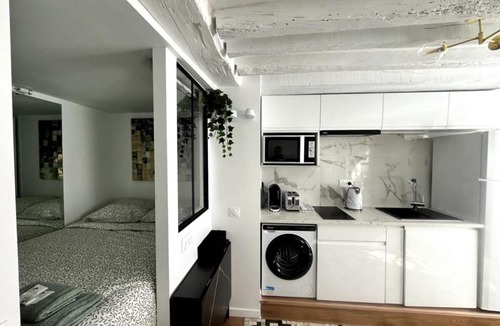 Chaussee-d'Antin Apartment | Opera 9th Rooftop Studio Full of Character managed by Mey Agency