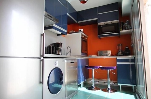 La Baule-Escoublac Apartment | Pop design apartment, renewed in 2008, terraces in the garden, heart of La Baule