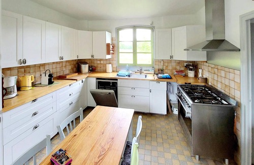 La Ferte-Saint-Aubin House | Relax in this historic and characterful holiday home with shared pool.
