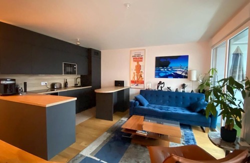 Clichy Apartment | Seine Serenity: Quaint 2BR Haven Near Arc de Triomphe with Balcony Bliss