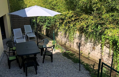 Honfleur House | the orchid at the edge of the water