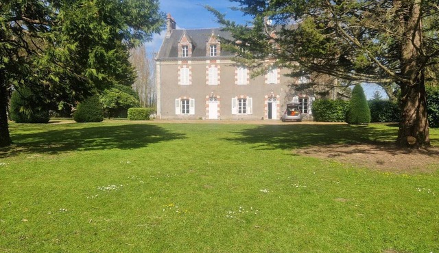 19th-century estate with wooded grounds and a river, near Paris