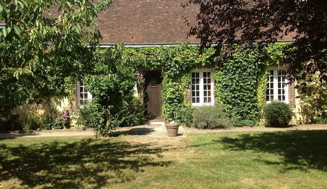A house 120 km from Paris, surrounded by fields, with its own enclosed garden