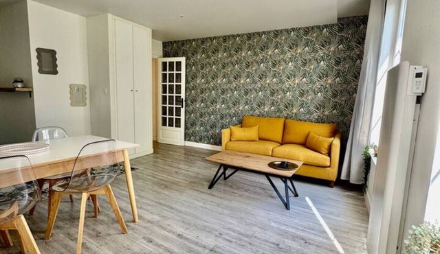 An Apartment Bathed in Light and Surrounded by Church Steeples