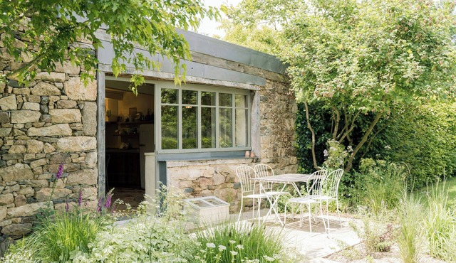 Cottage with glasshouse near Binic
