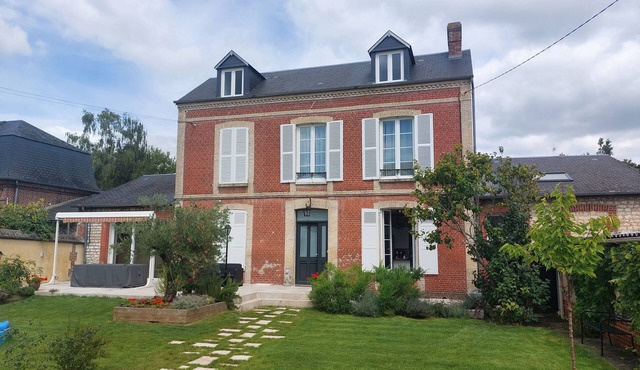 Family home, between town and country, peaceful setting.