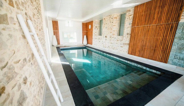 Former Norman convent with indoor swimming pool