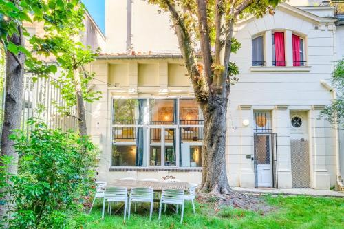 MONTMARTRE Sacré-Coeur, appartement jardin 6 à 8P