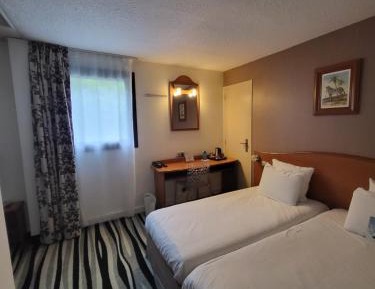 2 Single Beds  1 Junior Bed (Up To 10 Years)